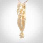This pendant is a gorgeous and intricately carved mermaid and merman pendant. Carved by renowned bone carver Yuri Terenyi for us, this is a little masterpiece. The craftsmanship displayed in this piece is extraordinary - a collectors item, or a piece to wear and love.